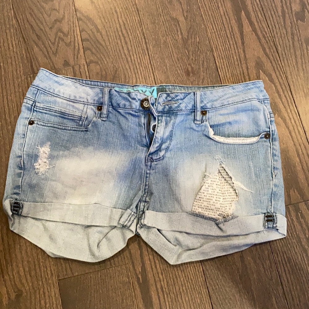 Distressed denim shorts